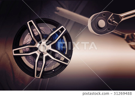 Double exposure. Repairing wheel concept. Double exposure. Repairing wheel concept. 31269488
