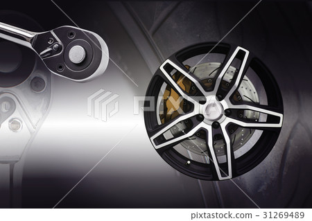 Double exposure. Repairing wheel concept. Double exposure. Repairing wheel concept. 31269489