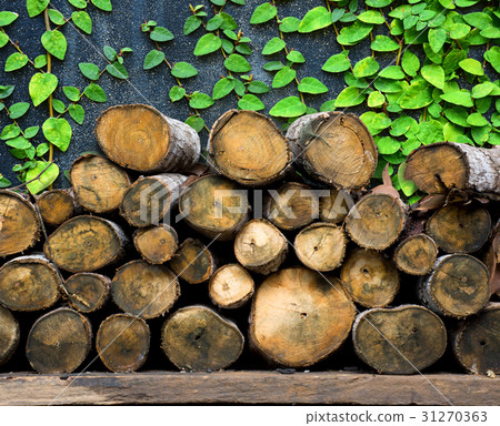 Natural wooden logs stacked.  31270363