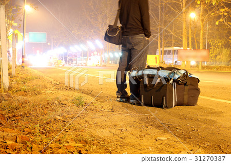 Vintage suitcases, photo camera on road 31270387