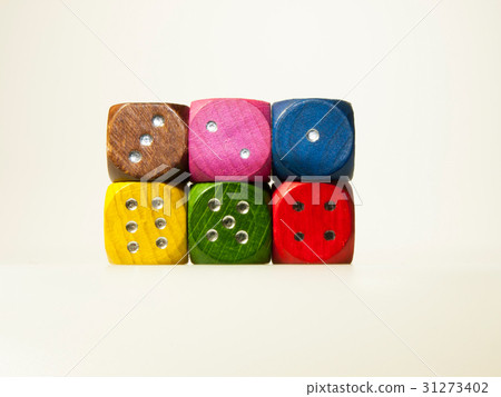 Multicolored wooden game dices with six numbers 31273402