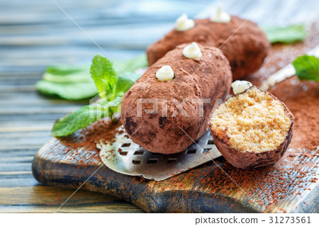 Homemade dessert potatoes and mint leaves. 31273561