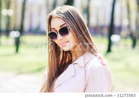 Closeup portrait of young beautiful fashionable 31273563