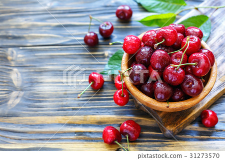 Bowl with ripe red sweet cherries. Bowl with ripe red sweet cherries. 31273570