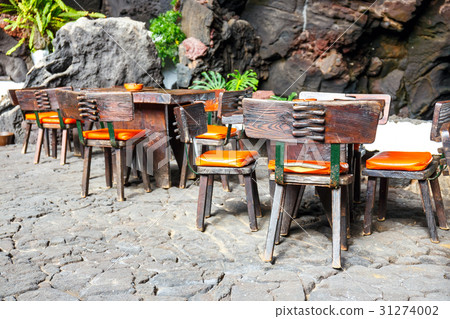 Tables and chairs in Jameos del Agua, Lanzarote Tables and chairs in Jameos del Agua, Lanzarote 31274002