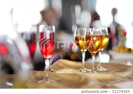 Few glasses of wine or another alcoholic beverage Few glasses of wine or another alcoholic beverage 31274265