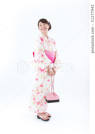 A woman in a yukata A woman in a yukata 31277942