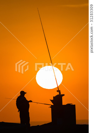 Fishermen Beach Sunrise Silhouetted Fishermen Beach Sunrise Silhouetted 31283309
