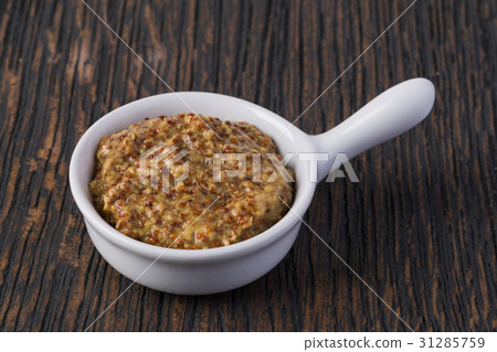 Bowl with mustard 31285759