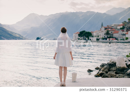 unidentified bride walking in picturesque bay 31290371