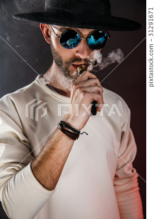 Stylish Man with vape Stylish Man with vape 31291671