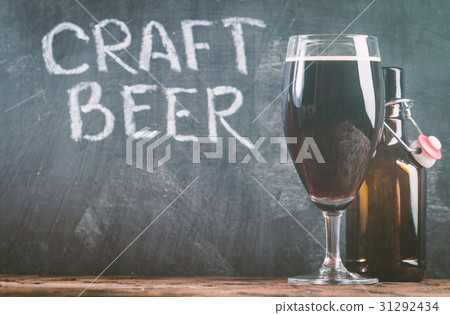 Glass of dark beer 31292434