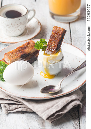 boiled eggs and crispy toasts boiled eggs and crispy toasts 31293077