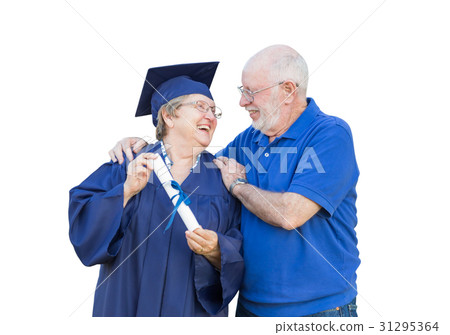 Senior Adult Woman Graduate in Cap and Gown Being Congratulated Senior Adult Woman Graduate in Cap and Gown Being Congratulated 31295364