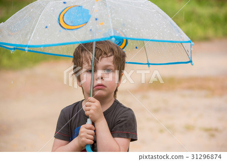 little boy with umbrella