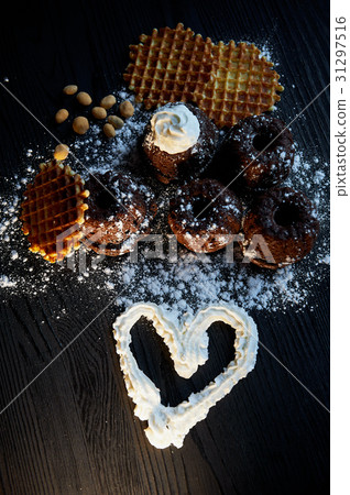 Lush fresh chocolate muffins sprinkled with 31297516