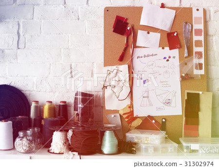 Fashion design's creative messy desk Fashion design's creative messy desk 31302974