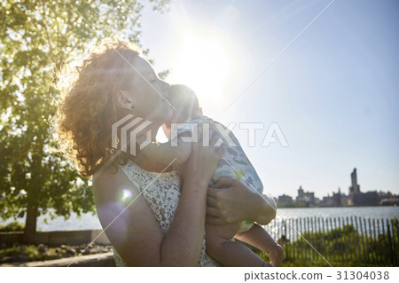 Mother with child in the park Mother with child in the park 31304038