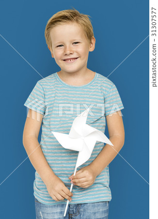 Little Boy Hands Holding Paper Wind Mill Studio Portrait Little Boy Hands Holding Paper Wind Mill Studio Portrait 31307577