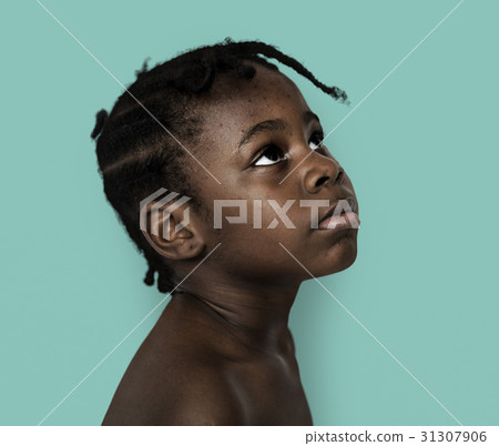 African Descent Boy Looks Up Focused Concentrated 31307906