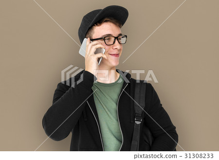 A teenager guy is on a phone 31308233