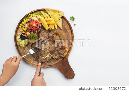 Tender grilled or t-bone steak. Tender grilled or t-bone steak. 31308672