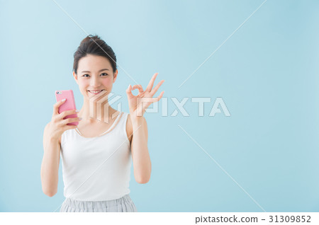 Woman with smartphone Woman with smartphone 31309852