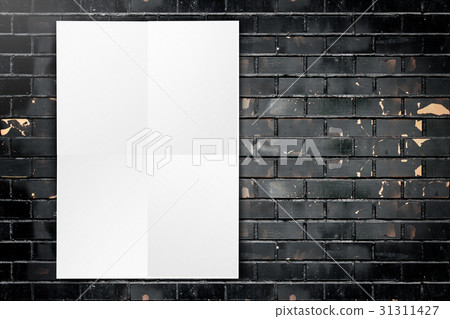 Black White poster hanging at grunge black brick Black White poster hanging at grunge black brick 31311427