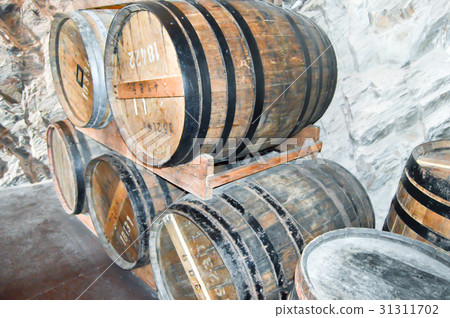 Ancient wooden barrels Ancient wooden barrels 31311702