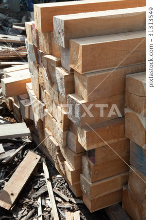 Stack teak wood square in lumber yard. pile Wooden 31313549
