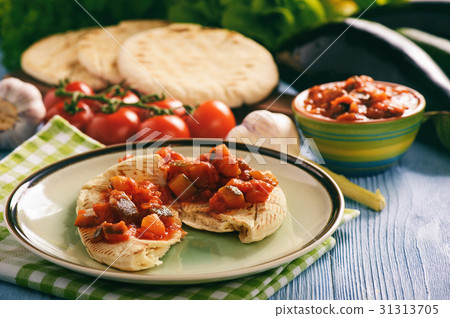 Pita bread with vegetable spread- mediterranean ki Pita bread with vegetable spread- mediterranean ki 31313705