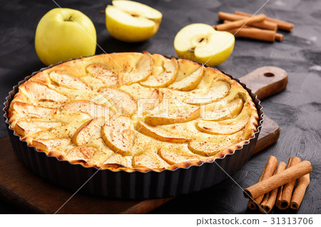 Homemade cheese pie with apples and cinnamon. 31313706