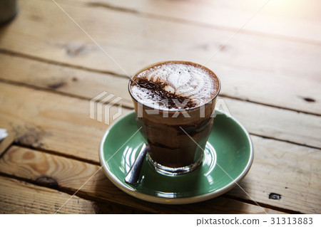 Coffee cup on a wood background 31313883