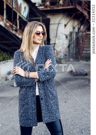 Portrait of a beautiful young woman in an 31314352
