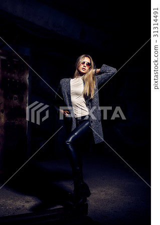 Portrait of a beautiful young woman in an 31314491