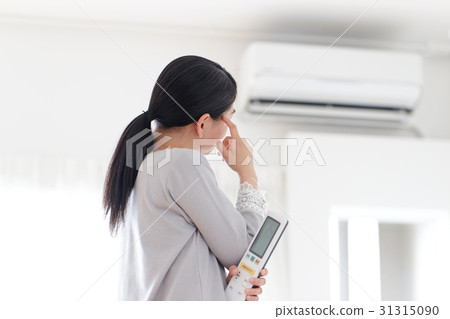 Air conditioner · troubled woman Air conditioner · troubled woman 31315090