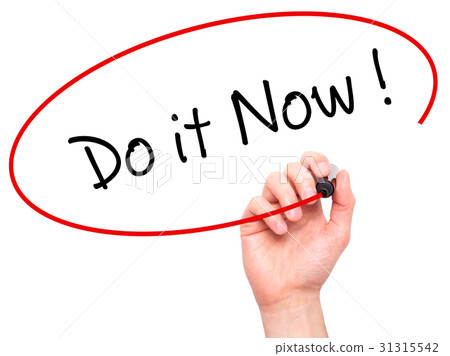 Man Hand writing Do it Now with black marker Man Hand writing Do it Now with black marker 31315542