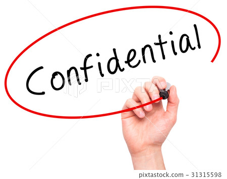 Man Hand writing Confidential with black marker Man Hand writing Confidential with black marker 31315598