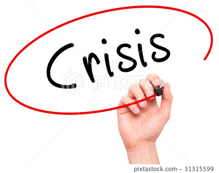Man Hand writing Crisis with black marker Man Hand writing Crisis with black marker 31315599
