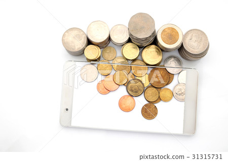Mobile technology and coins on white background 31315731