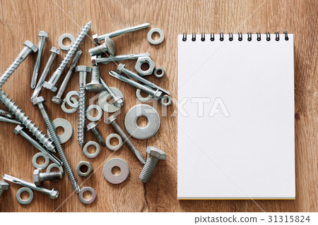 Construction tools. The screws, nuts and bolts 31315824