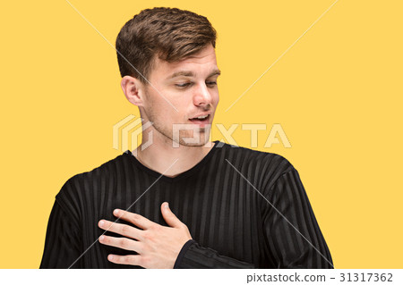 The young man smiling and looking away The young man smiling and looking away 31317362