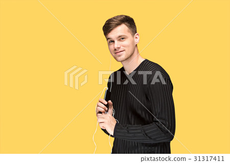 The young man smiling and looking away 31317411