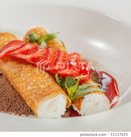 Connolly with lime cream and strawberries Connolly with lime cream and strawberries 31317835