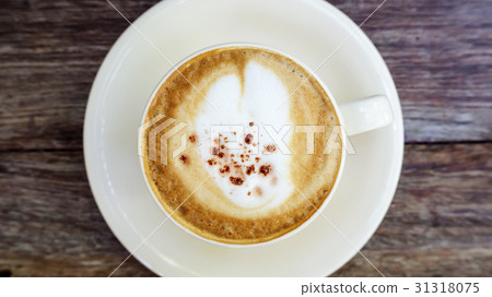 Hot cappuccino coffee in a white cup. 31318075