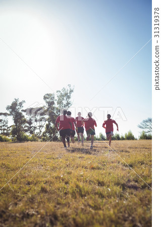 Trainer training kids in the boot camp 31319378