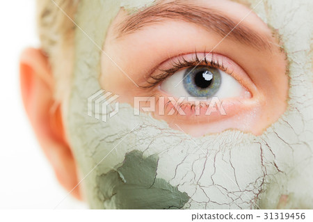 Skin care. Woman in clay mud mask on face. Beauty. Skin care. Woman in clay mud mask on face. Beauty. 31319456