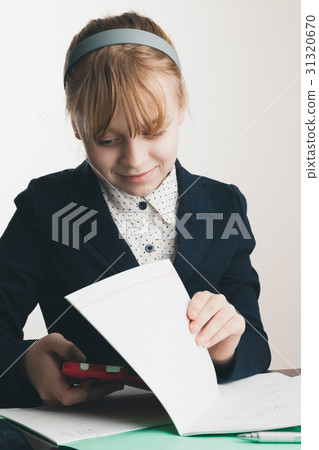 School girl uses her smartphone for social media 31320670