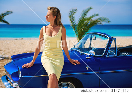 Woman near retro cabriolet car  31321162