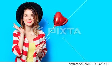 Woman with heart shape toy Woman with heart shape toy 31321412